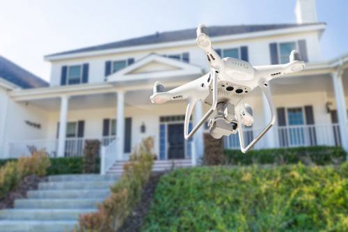 drone_phographing_house.jpg drone_phographing_house.jpg